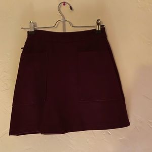 Fitted burgundy mini skirt